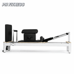 Seitenansicht des weißen PH Fitness Pilates Reformers aus Aluminium