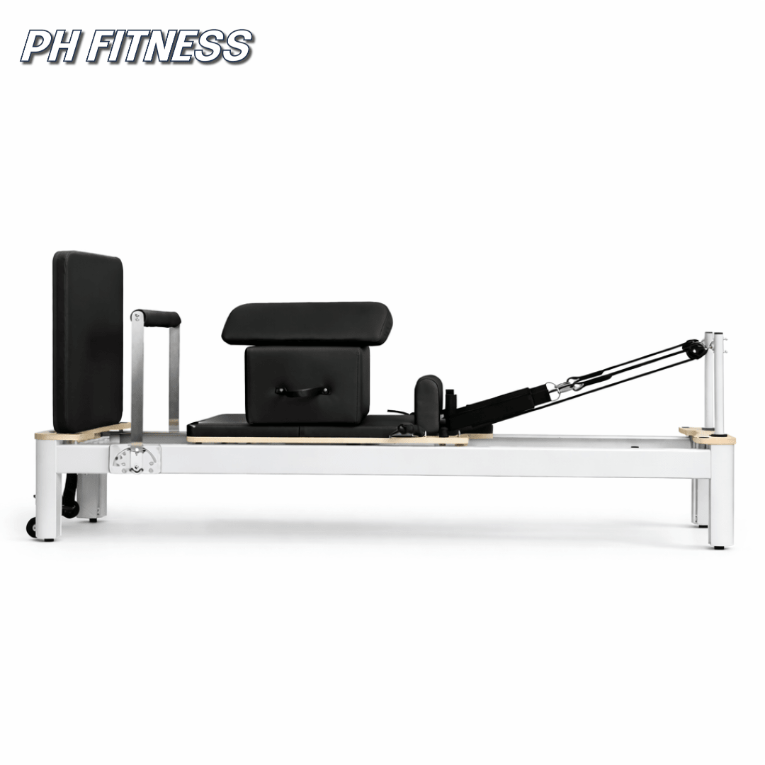 Seitenansicht des weißen PH Fitness Pilates Reformers aus Aluminium