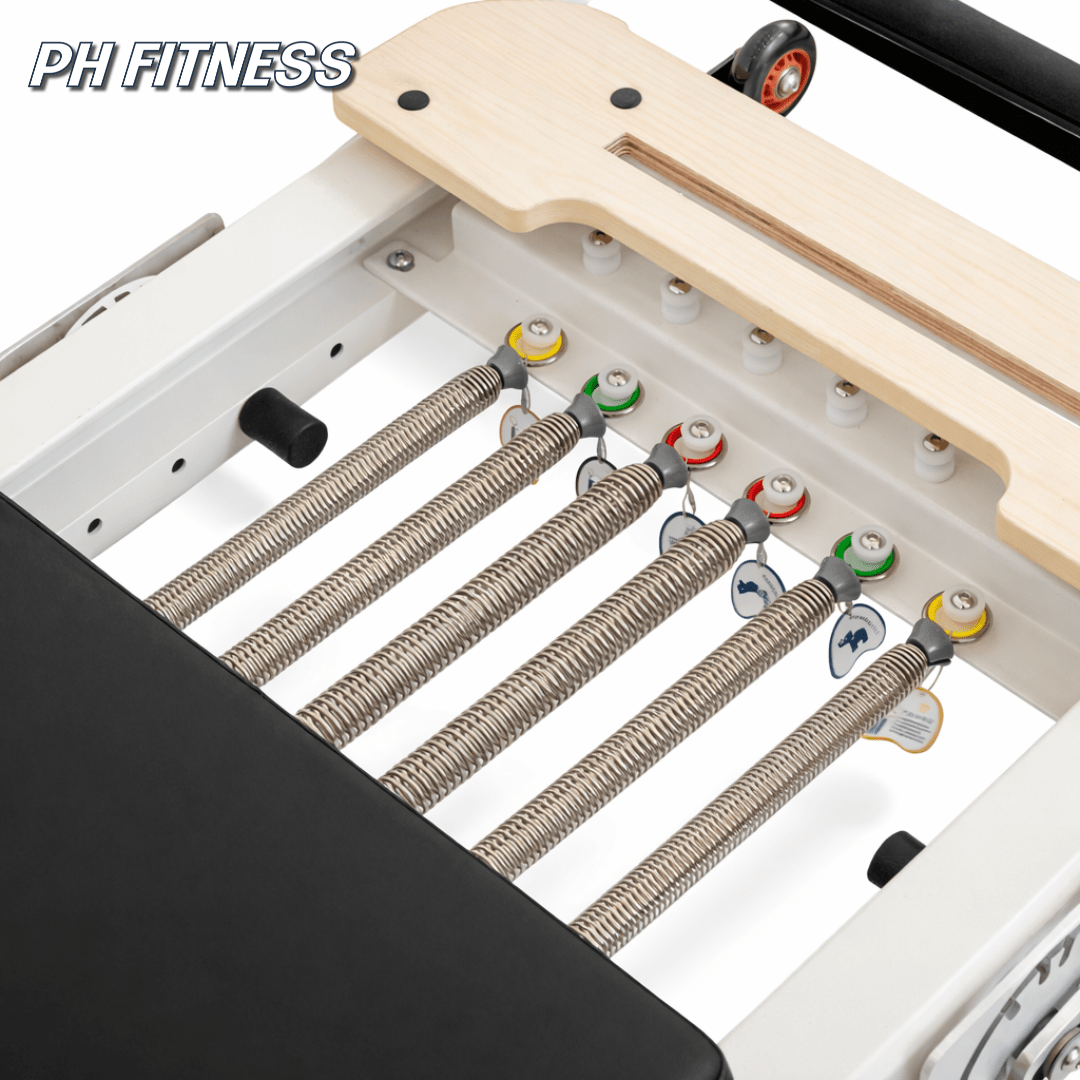 Nahaufnahme des Systems mit sechs einstellbaren Federn am Pilates Reformer
