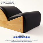 Detail der schwarzen Polsterung und des Holzrahmens des Spine Corrector