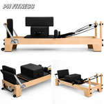 Pilates-Reformer aus Holz in Seiten- und Vorderansicht